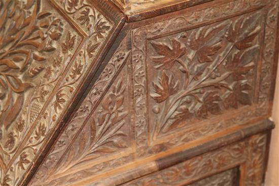 An Anglo Indian foliate carved camphorwood bureau, c.1900, W.92cm